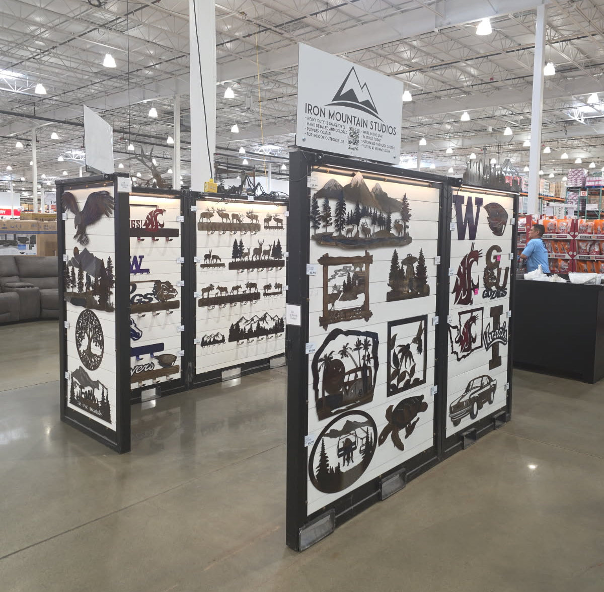 Display of metal wall in a store setting.